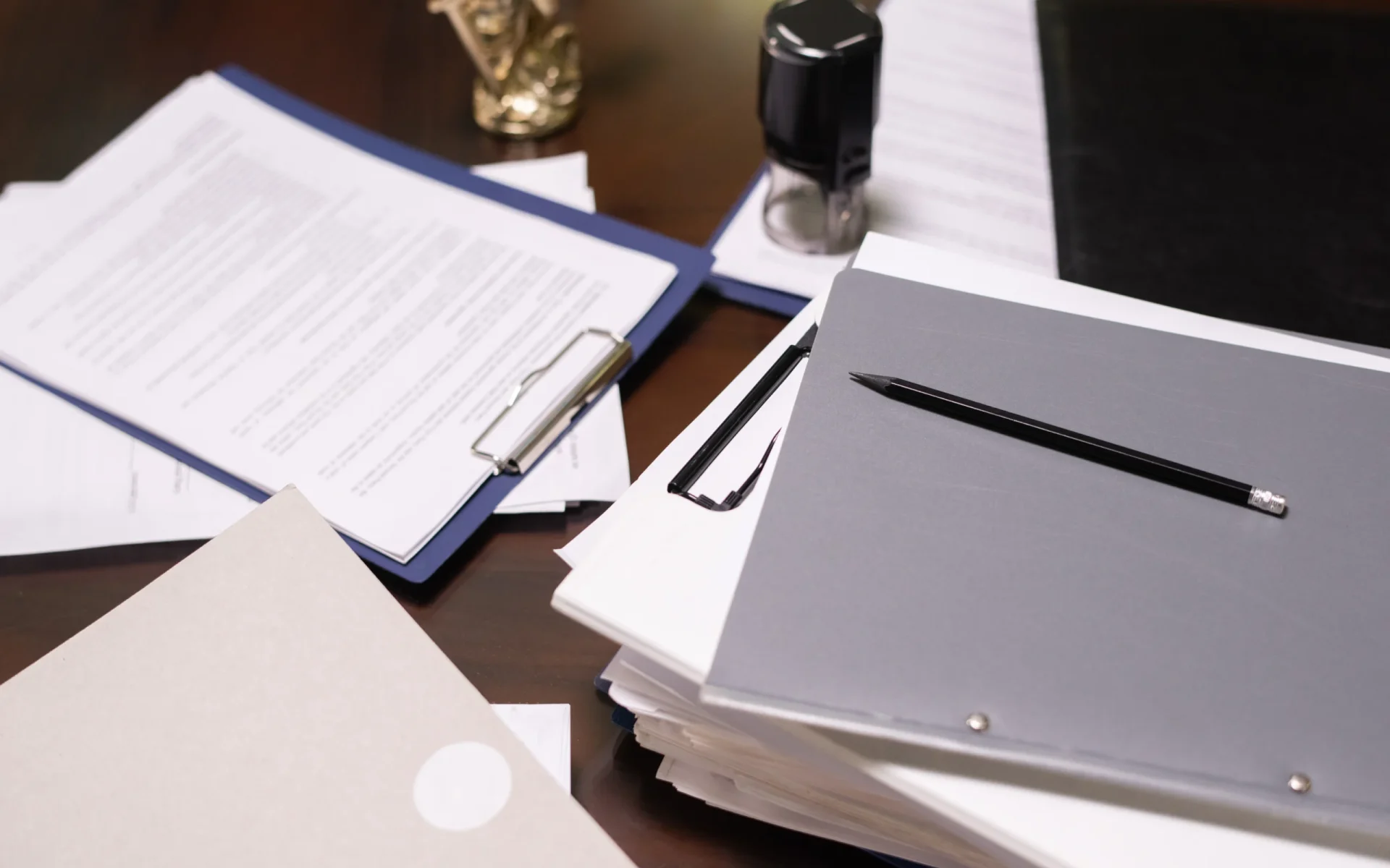 stack-of-juridical-documents-in-folders-and-clipbo-2025-03-16-15-07-17-utc